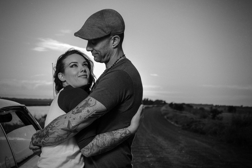 edgy black and white engagement session of a tatted bride and groom by matthew leland photography